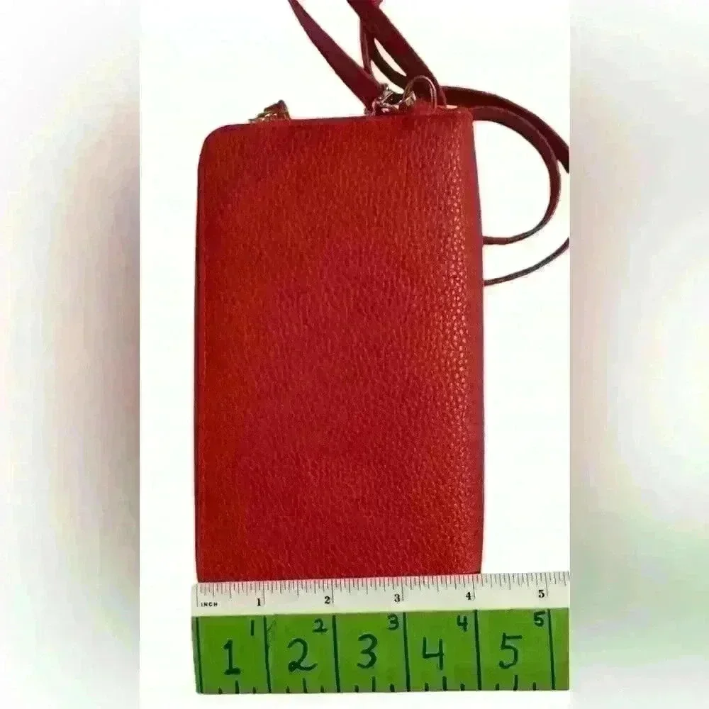 A Forever Young red woman’s,Crossbody bag / wallet with attached iPhone carrier.